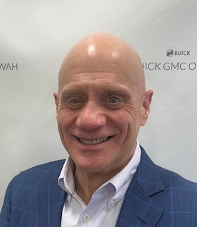 Staff member Robert Cohen  from ID_02d1f6128dd8