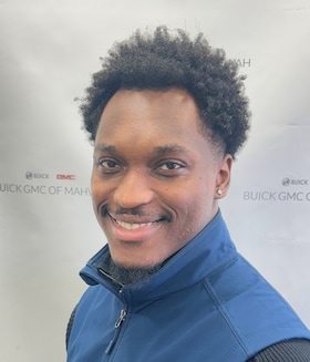 Staff member Ekene "Kenny" Tuke from ID_bc196bb6446c