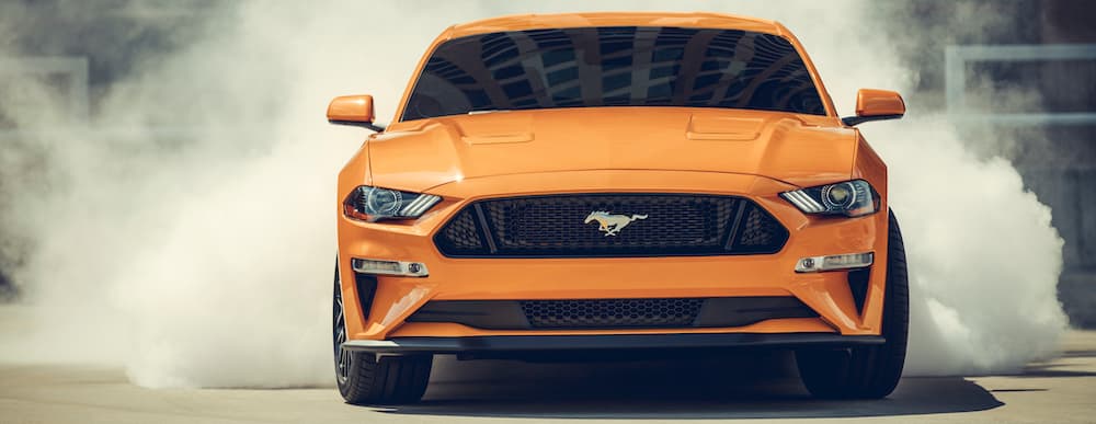 2019 Orange Ford Mustang Doing A Burnout