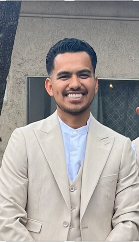 Staff member Alex Santa Rosa from ID_d498b2d81e80