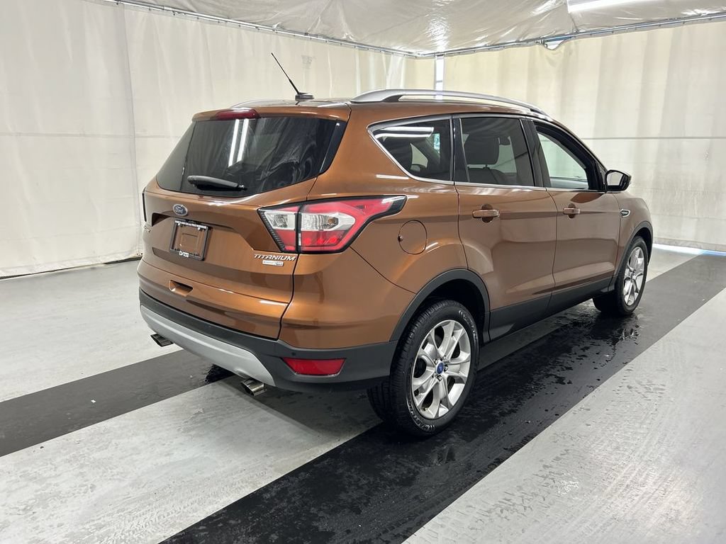 Used 2017 Ford Escape Titanium with VIN 1FMCU9JD8HUD32582 for sale in Cicero, NY