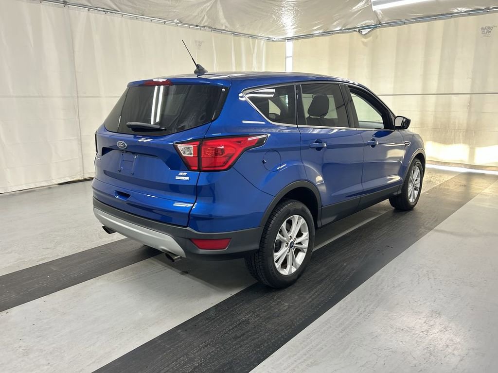 Used 2019 Ford Escape SE with VIN 1FMCU9GD8KUB42859 for sale in Cicero, NY