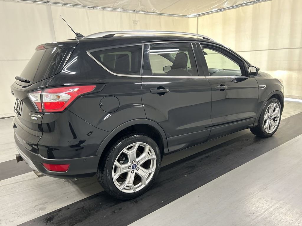 Used 2018 Ford Escape Titanium with VIN 1FMCU9J94JUD36257 for sale in Cicero, NY