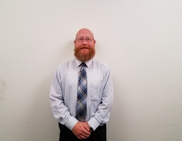 Staff member Christopher Finger from a7593e8dedf4