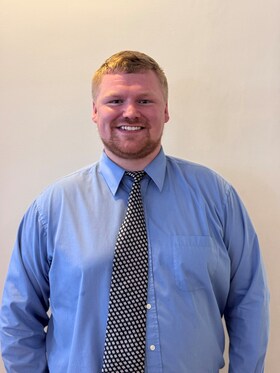 Staff member Sam Hill from d4fc680a3094