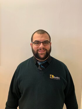 Staff member James Quattro from d4fc680a3094