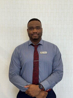 Staff member Marcus Dozier from 5db18d8a8802