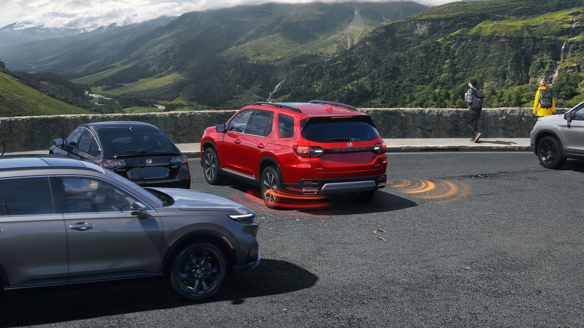  A red 2025 Honda Pilot equipped with parking sensors and safety features, parked near scenic mountains.