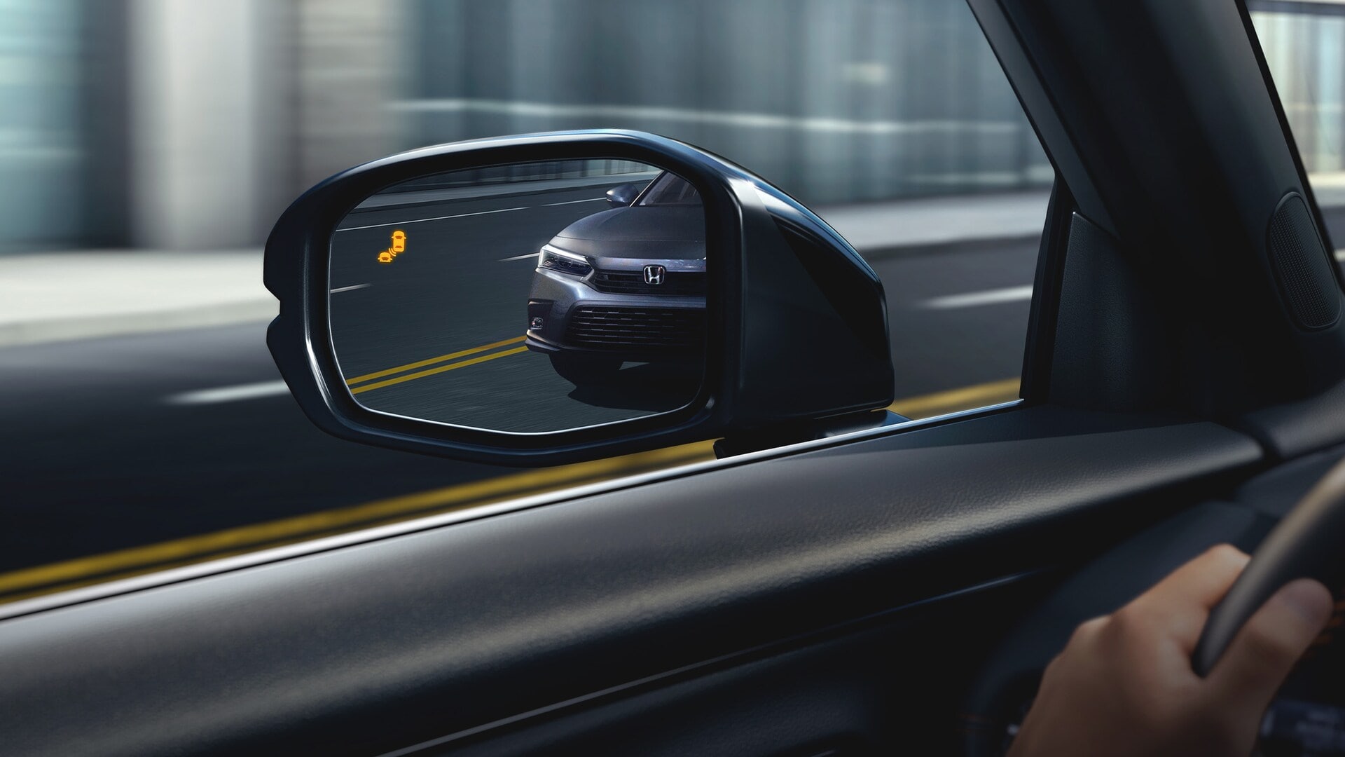 The side mirror view from a car.