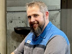 Staff member Avery P from 8c53438f70cd