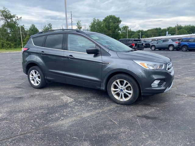 Used 2018 Ford Escape SE with VIN 1FMCU0GD5JUC58157 for sale in Pinconning, MI