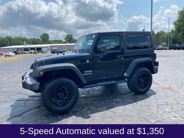 Used 2015 Jeep Wrangler Sport with VIN 1C4AJWAGXFL673434 for sale in Pinconning, MI