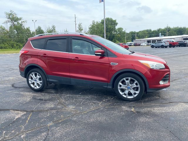Used 2014 Ford Escape Titanium with VIN 1FMCU0JX4EUD79173 for sale in Pinconning, MI