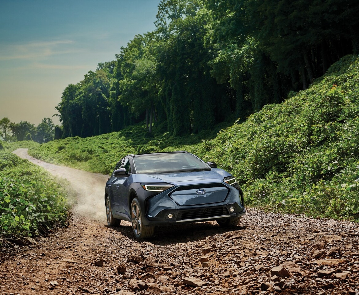  Person cheerfully signing documents.