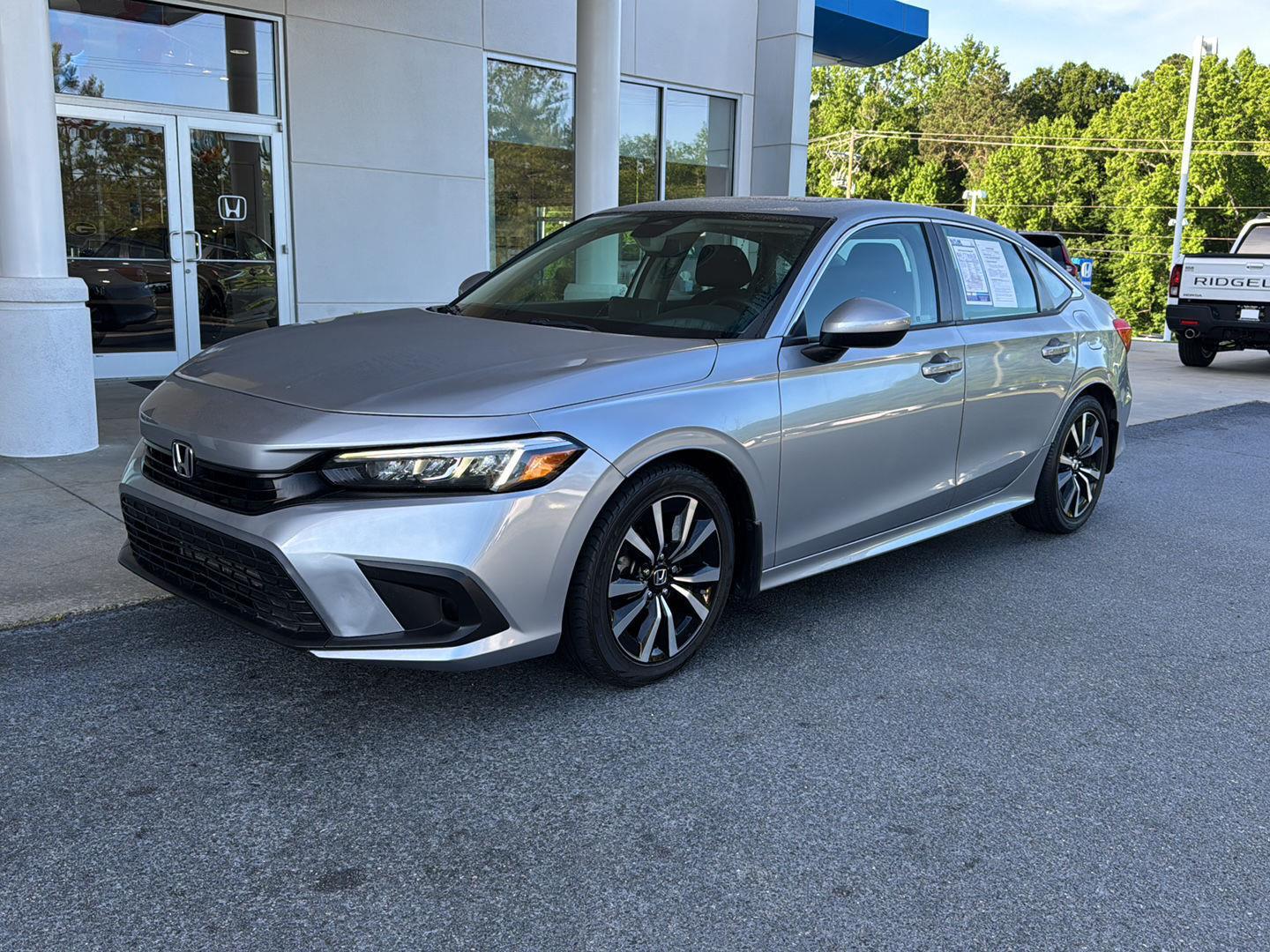 Used 2023 Honda Civic EX with VIN 2HGFE1F70PH303745 for sale in Milledgeville, GA