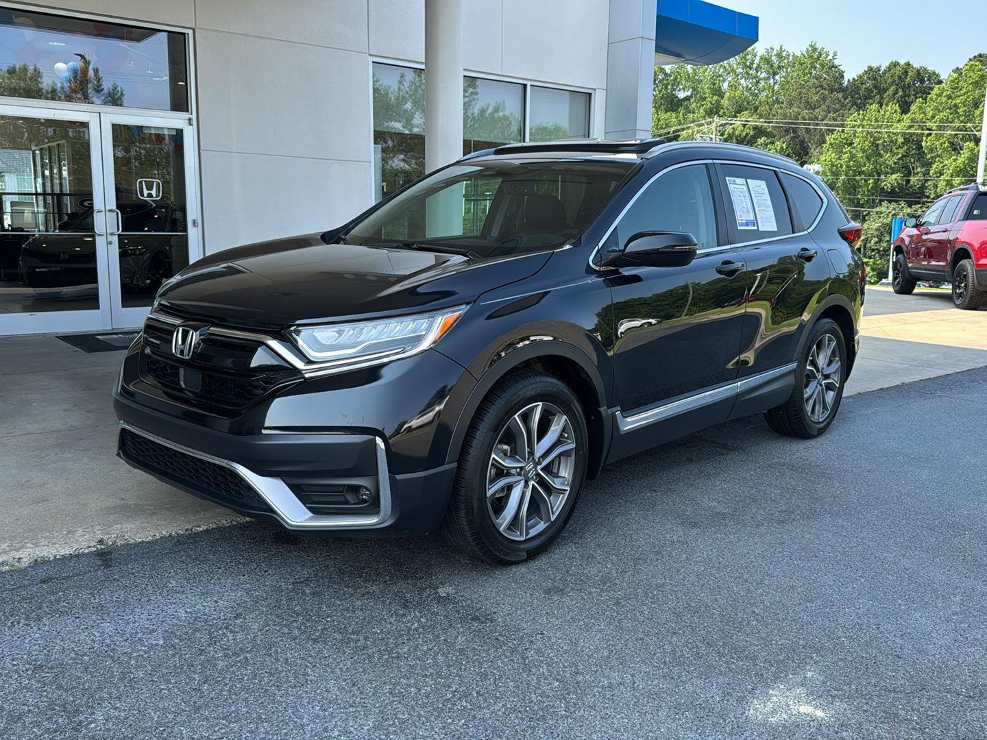 Used 2021 Honda CR-V Touring with VIN 5J6RW1H94ML006252 for sale in Milledgeville, GA