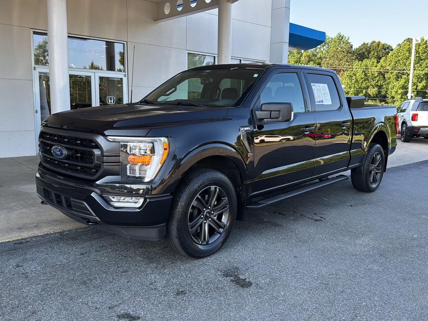 Used 2022 Ford F-150 XLT with VIN 1FTFW1E84NKF19948 for sale in Milledgeville, GA