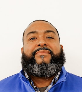 Staff member Tavares Bell from ID_542ff00cec09