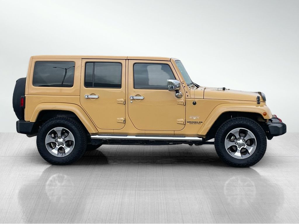 Used 2014 Jeep Wrangler Unlimited Sahara with VIN 1C4BJWEG0EL132230 for sale in Butte, MT