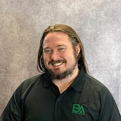 Staff member Tad Dugdale from ID_574713