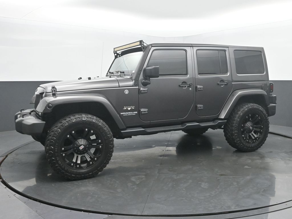 Used 2016 Jeep Wrangler Unlimited Sahara with VIN 1C4BJWEG7GL212305 for sale in Kokomo, IN