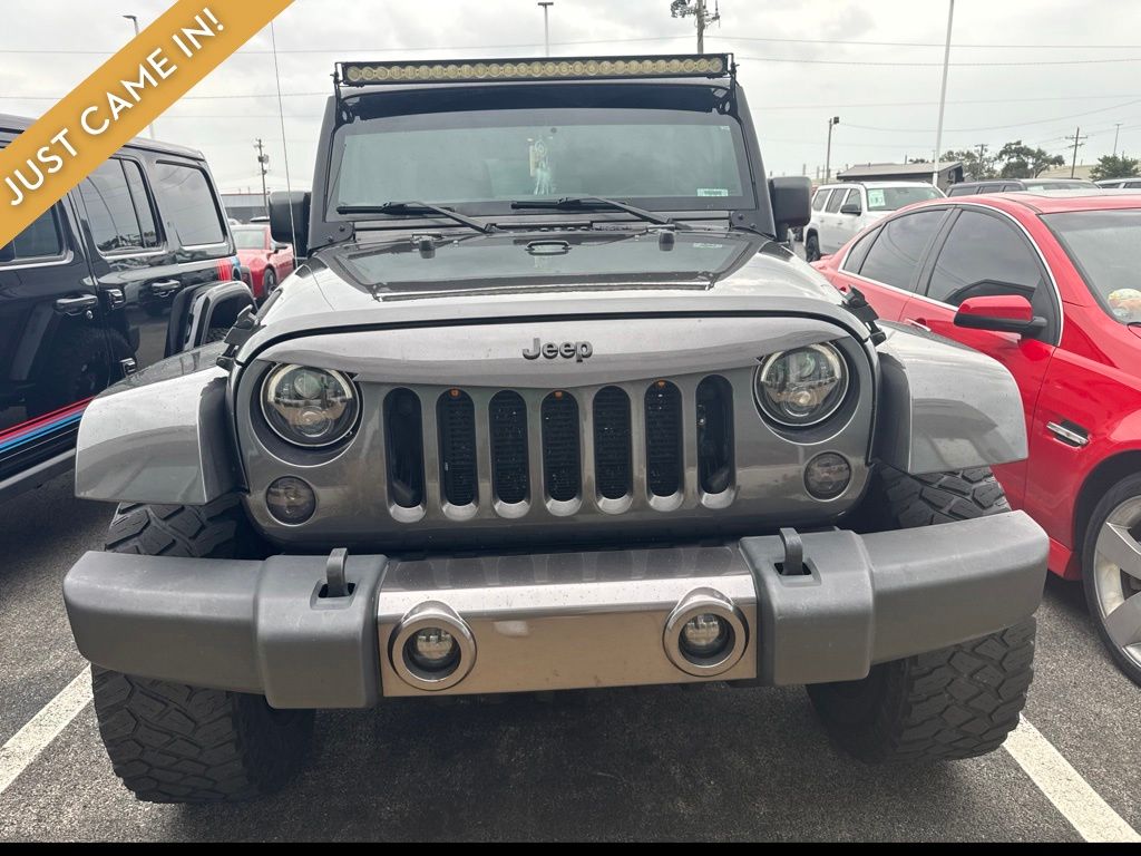 Used 2016 Jeep Wrangler Unlimited Sahara with VIN 1C4BJWEG7GL212305 for sale in Kokomo, IN