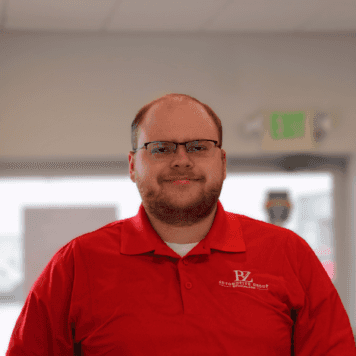 Staff member Andrew Cook from ID_c0c413