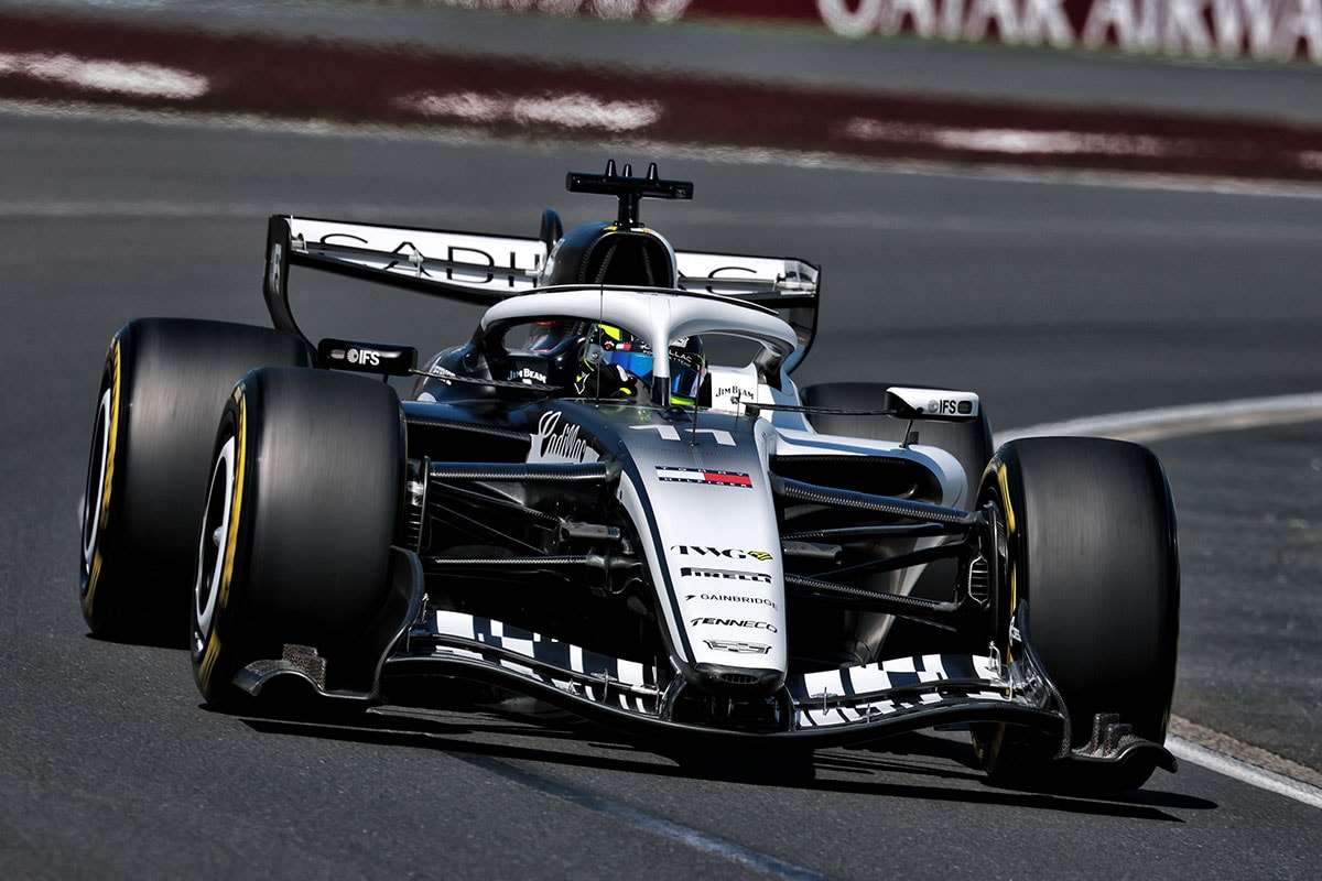 Front View of the White Cadillac F1 Racecar Parked on a Track