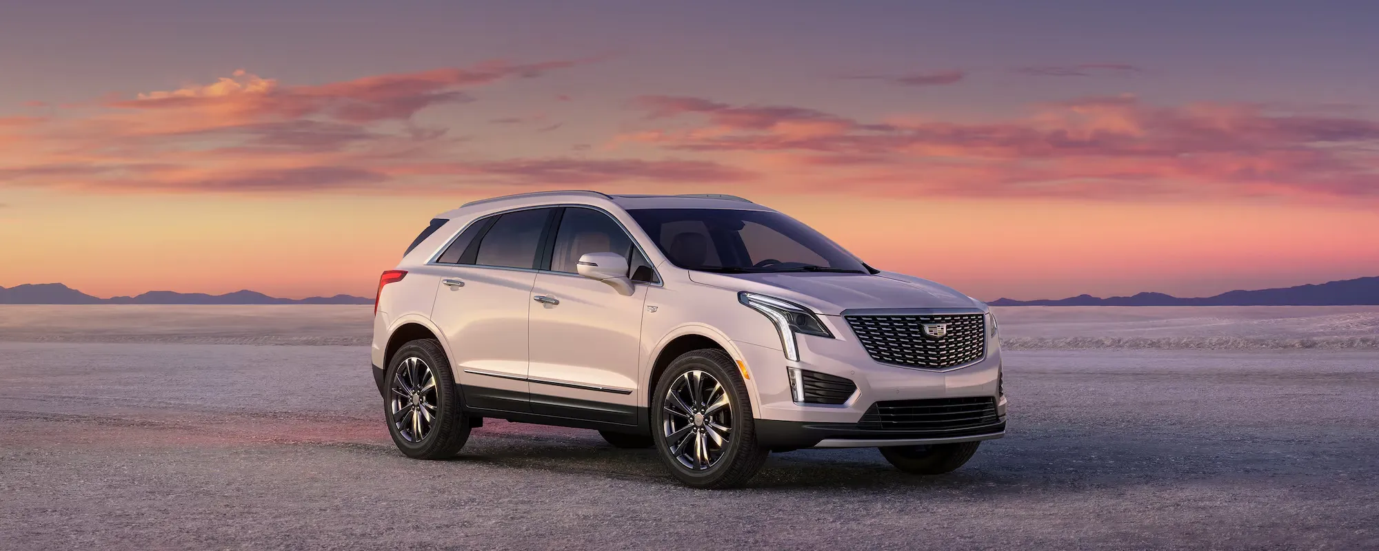 The 2026 Cadillac XT5 Parked with a Beautiful Sunset in the Background