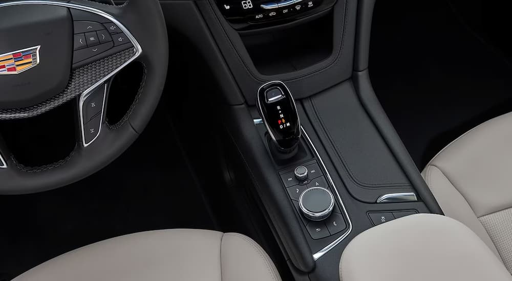 A close up of the center console of a 2023 Cadillac XT5 is shown.