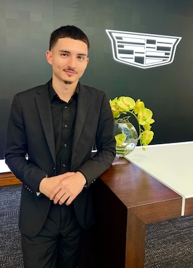 Staff member Justin Bordina from ID_3c7ef0f4f742