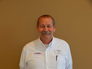 Staff member MARK NORMAN from ID_d32338808969