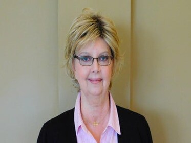 Staff member JANICE BELL from ID_4a75003c0e44