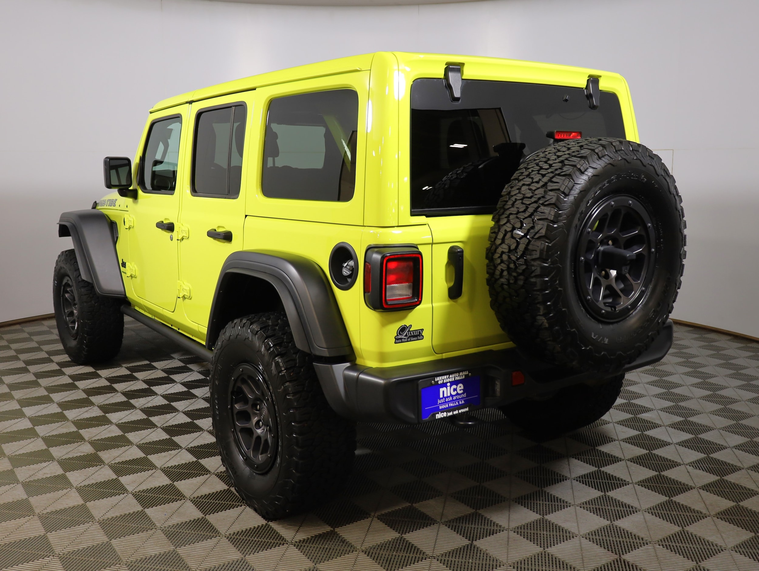 Used 2023 Jeep Wrangler 4-Door High Tide with VIN 1C4HJXDG4PW647220 for sale in Sioux Falls, SD