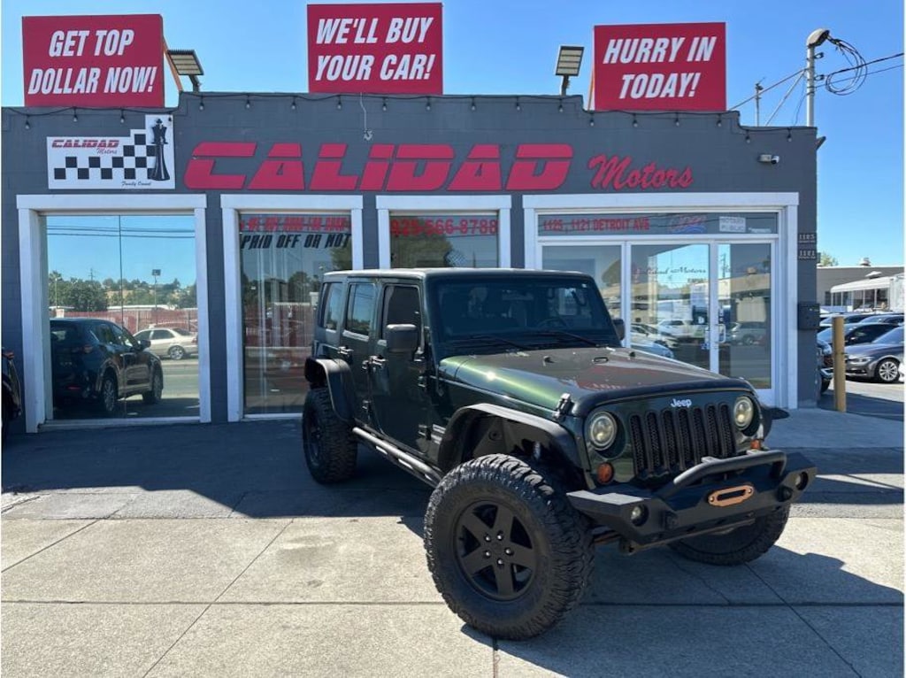 Used 2011 Jeep Wrangler Unlimited Sport Convertible