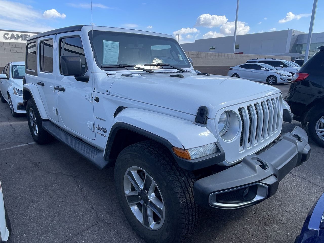 Used 2018 Bright White Jeep Unlimited Sahara 4x4 image 2