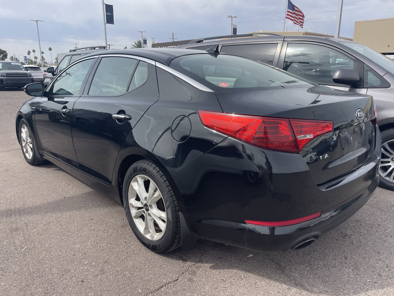 Used 2011 Ebony Black Kia EX image 13