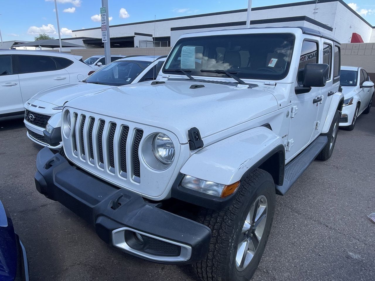 Used 2018 Bright White Jeep Unlimited Sahara 4x4 image 3