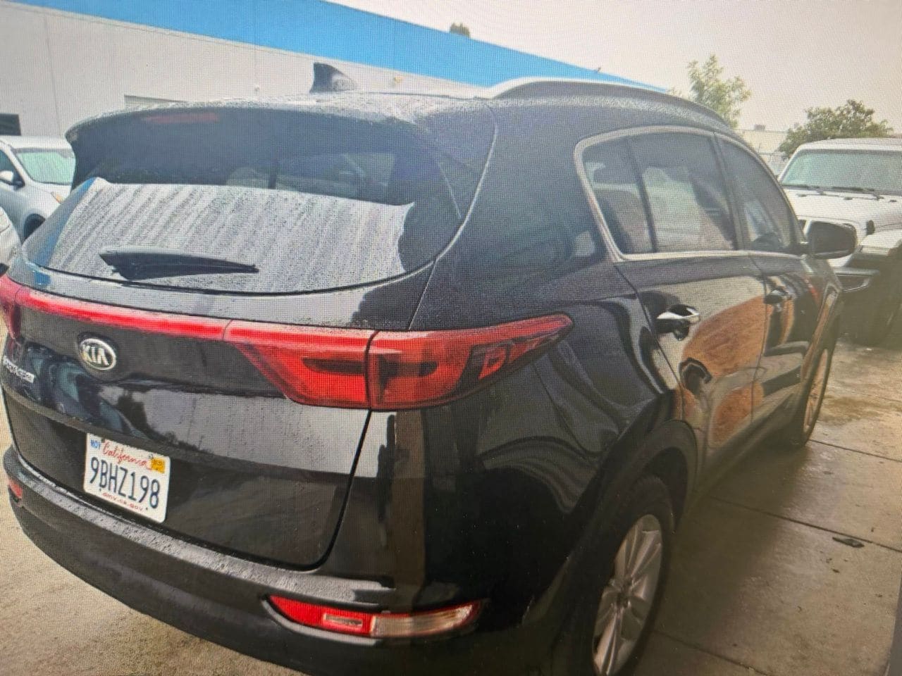 Used 2018 Black Cherry Kia LX image 4