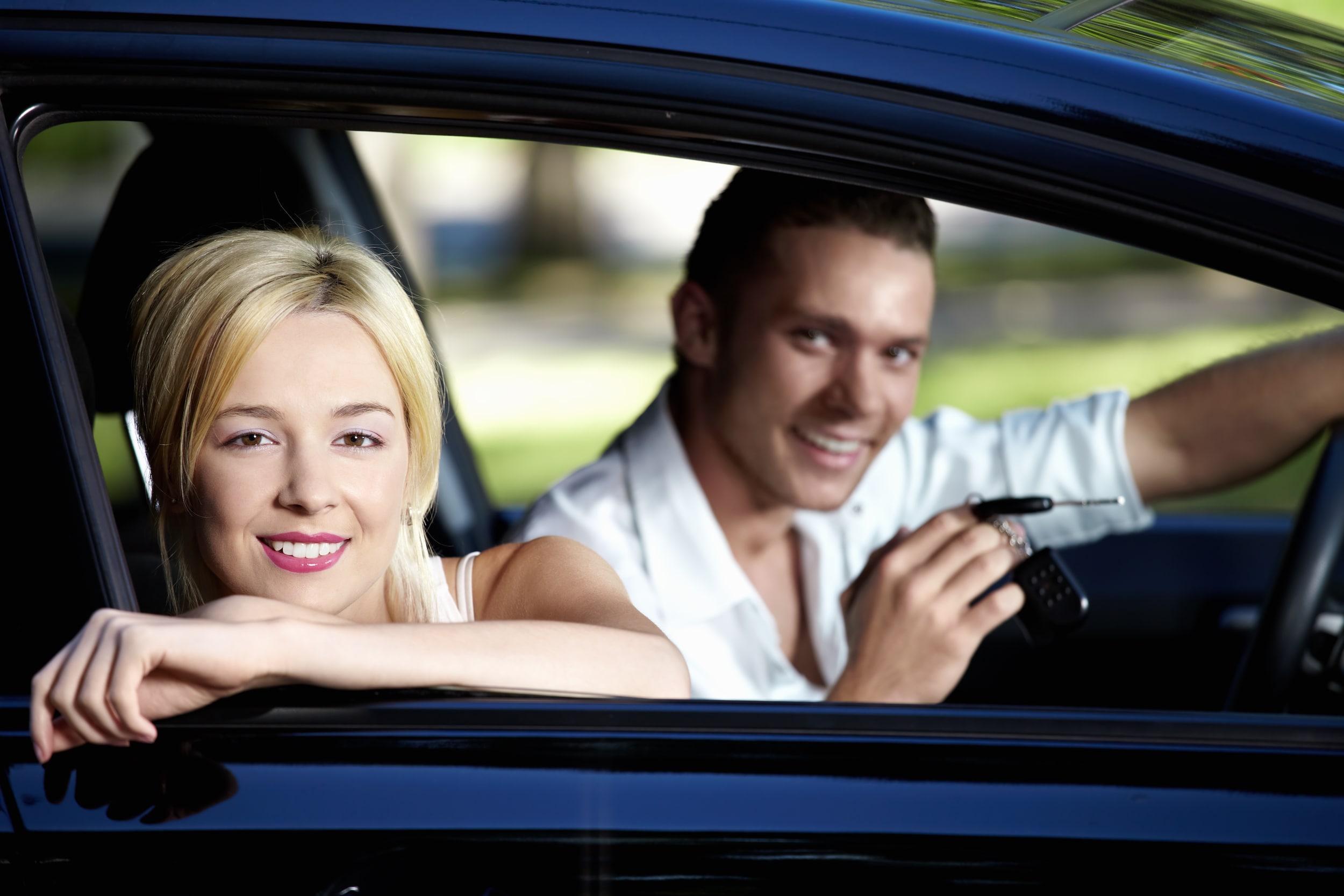 couple in new car