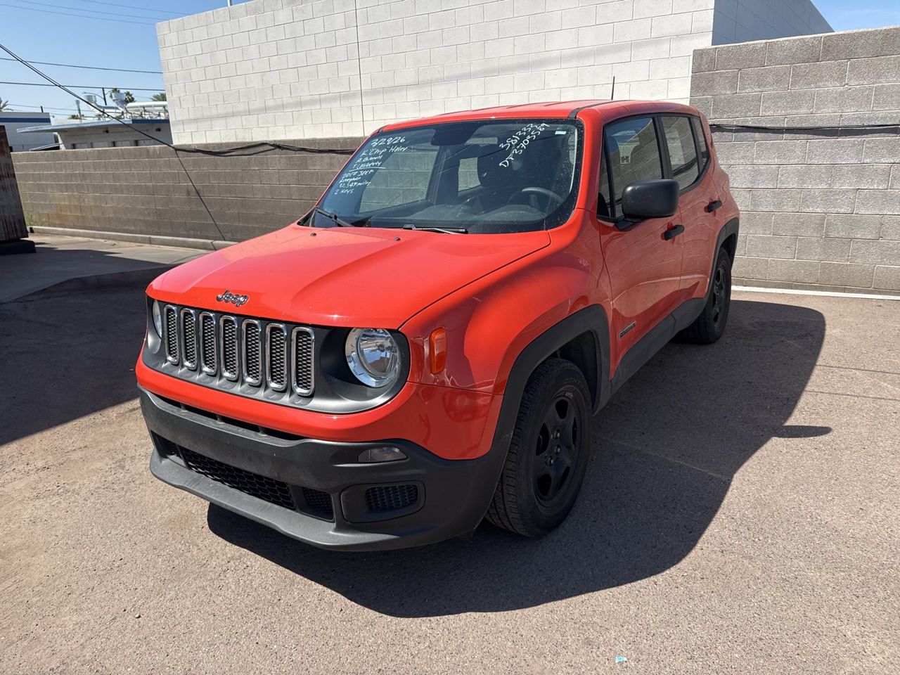 Used 2017 Omaha Orange Jeep Sport image 12