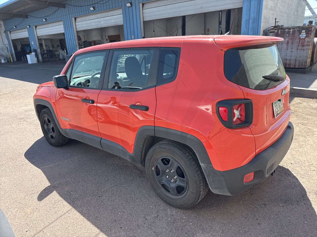 Used 2017 Omaha Orange Jeep Sport image 8