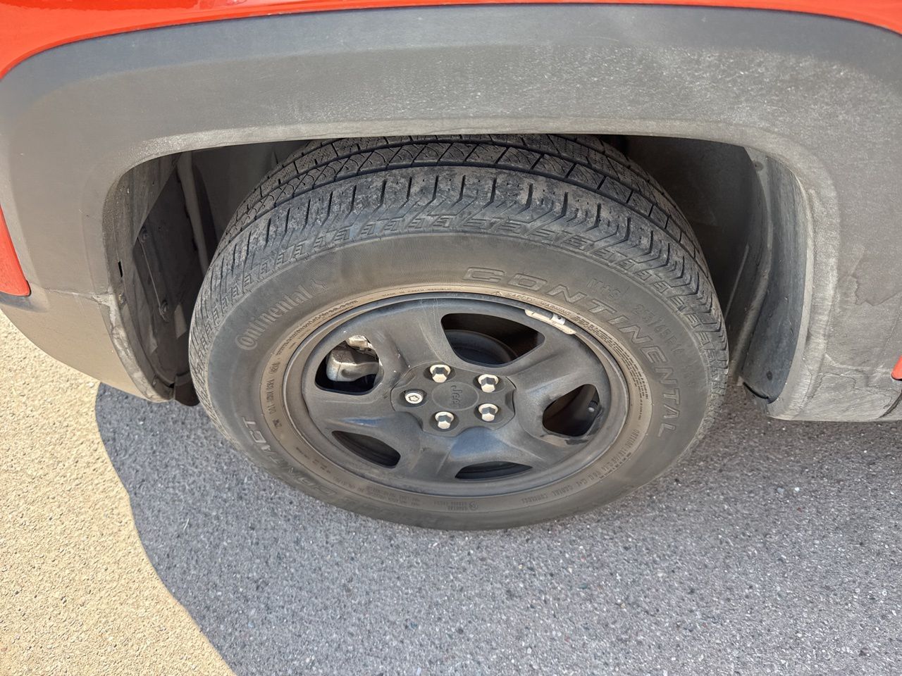 Used 2017 Omaha Orange Jeep Sport image 5