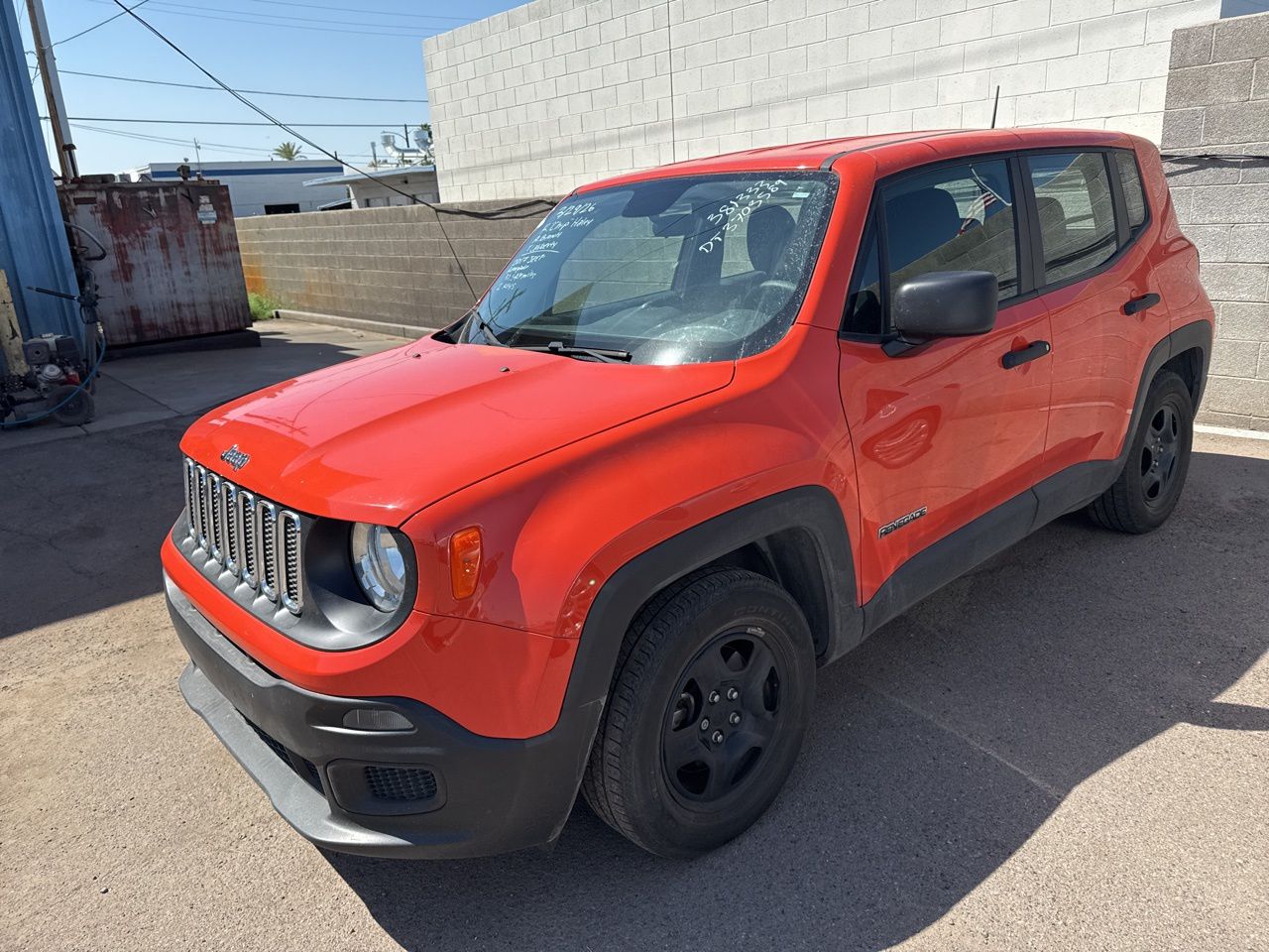 Used 2017 Omaha Orange Jeep Sport image 13