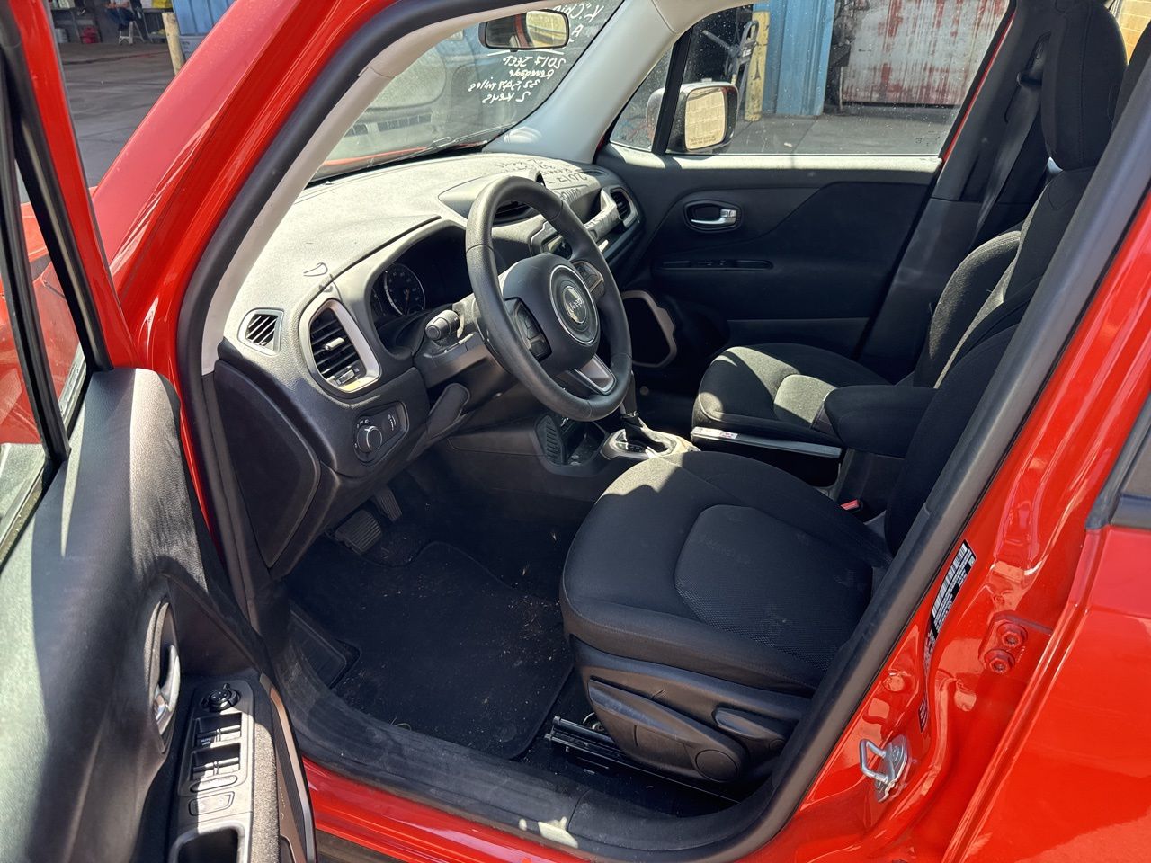 Used 2017 Omaha Orange Jeep Sport image 4