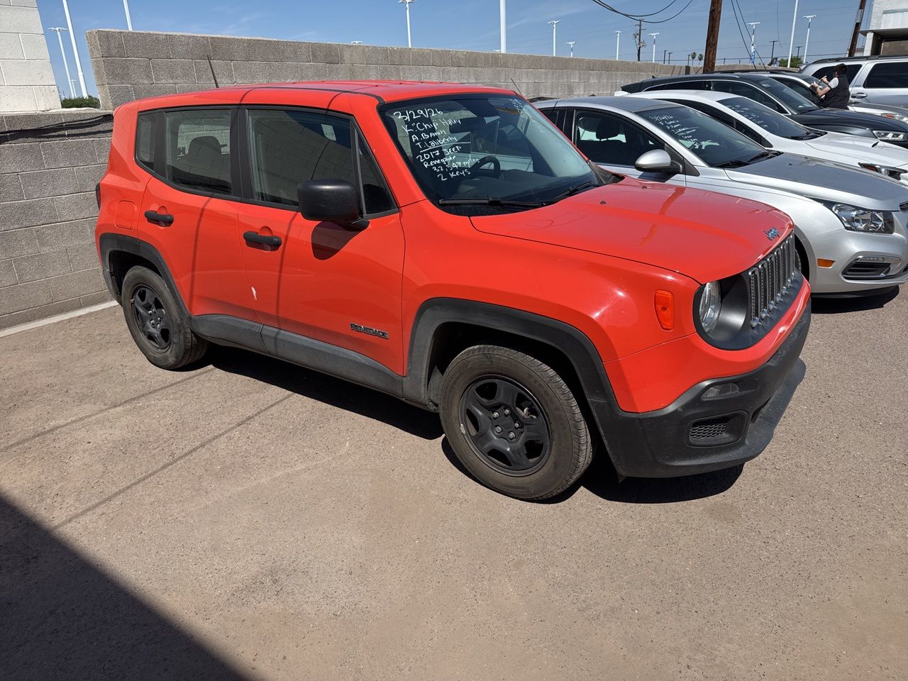 Used 2017 Omaha Orange Jeep Sport image 11