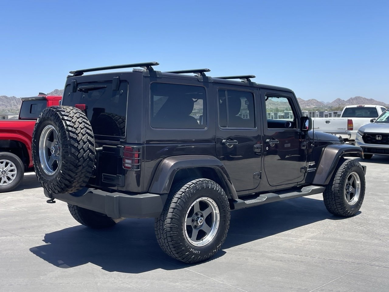 Used 2013 Jeep Wrangler Unlimited Sahara with VIN 1C4HJWEG5DL655641 for sale in Phoenix, AZ