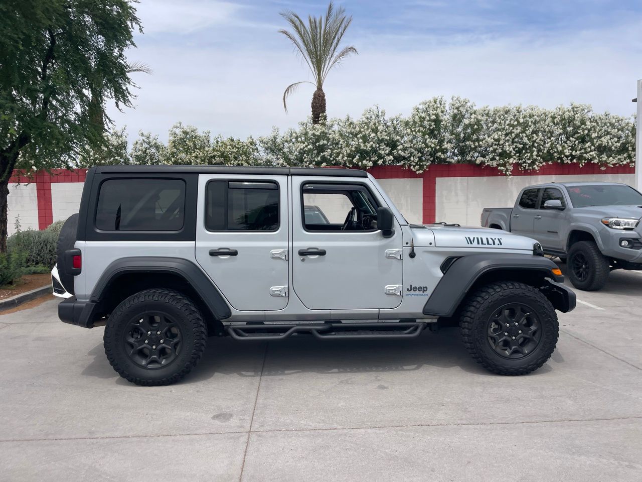 Used 2023 Jeep Wrangler 4xe Willys 4XE with VIN 1C4JJXN67PW642701 for sale in Phoenix, AZ