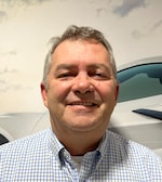 Staff member ANDREW WILSON from 97dc4a6dc9c0