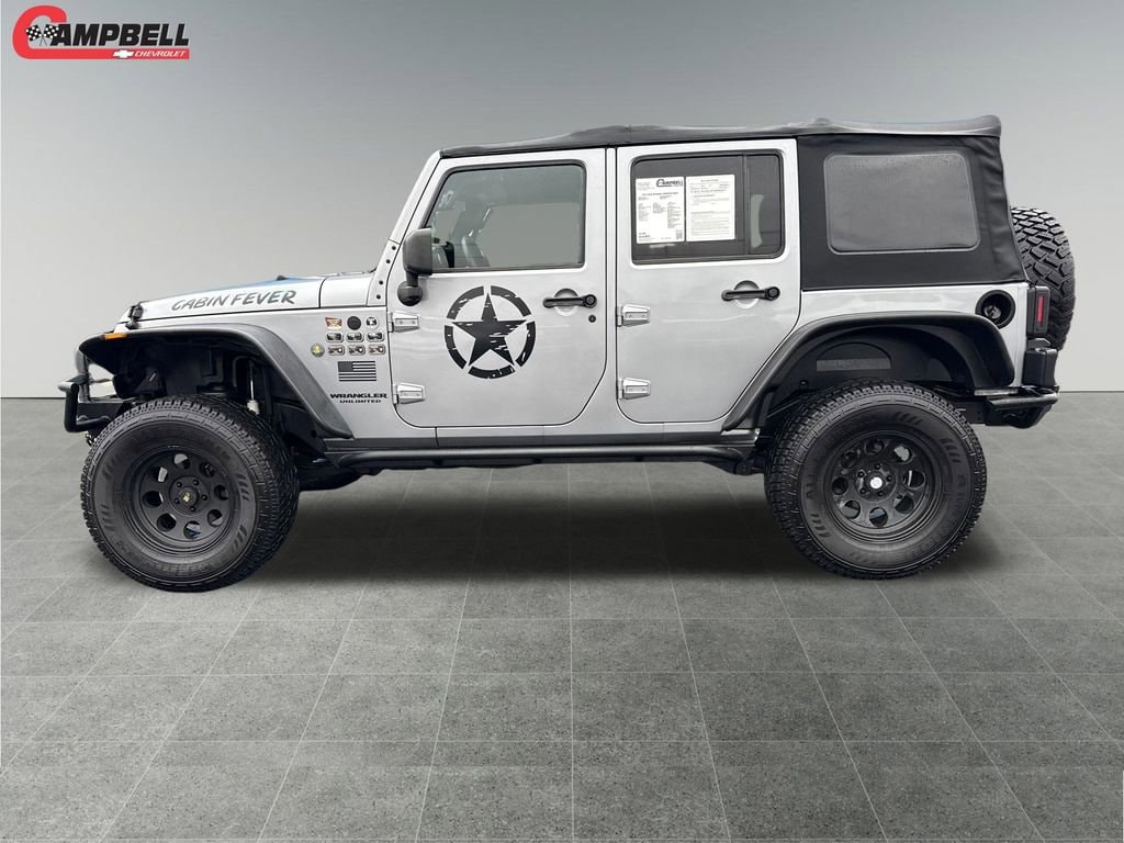 Used 2014 Jeep Wrangler Unlimited Sport SUV